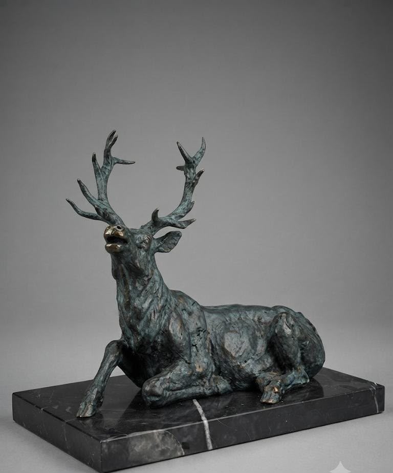 Majestic Reindeer Resting in Its Glory Hot Cast Bronze Sculpture